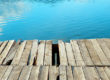 A weathered deck along the water